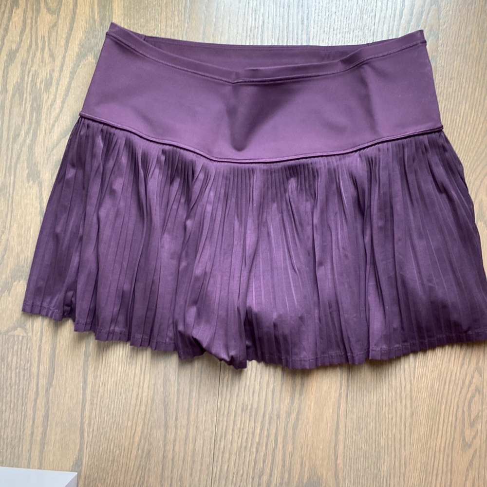 Athleta tennis skirt in wine color. Size L